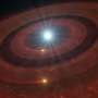 Double debris disk orbiting a dead star hints at our solar system's future