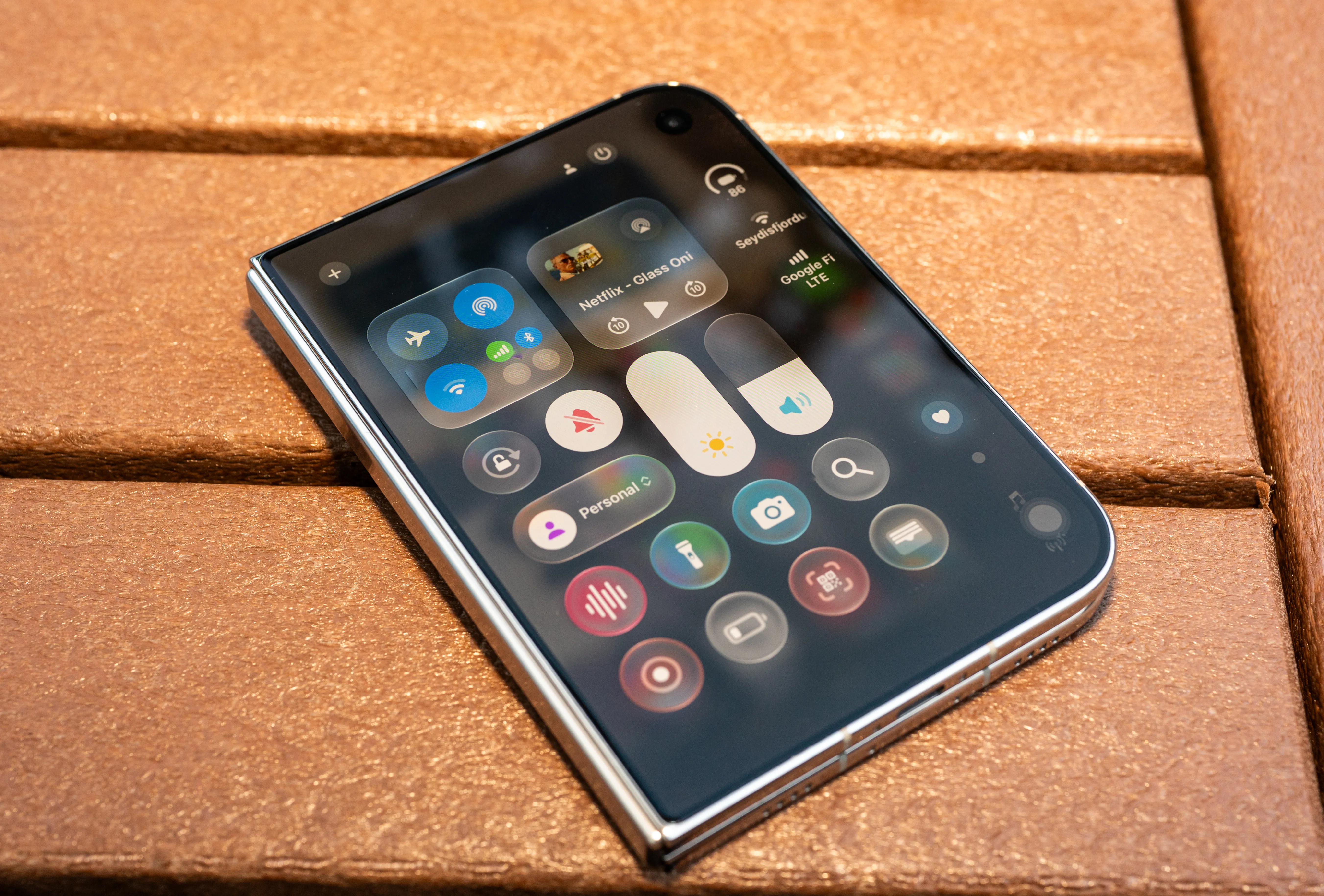 How Apple Finally Makes the Divisive Liquid Glass Aesthetic Work on New iPhone Hardware