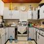 The Strategic Advantage of Clutter: Why Moderate Disorganization Benefits Household Well-Being